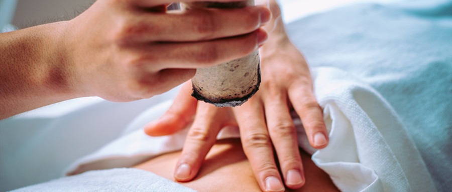 Professional moxibustion therapy in a serene clinic